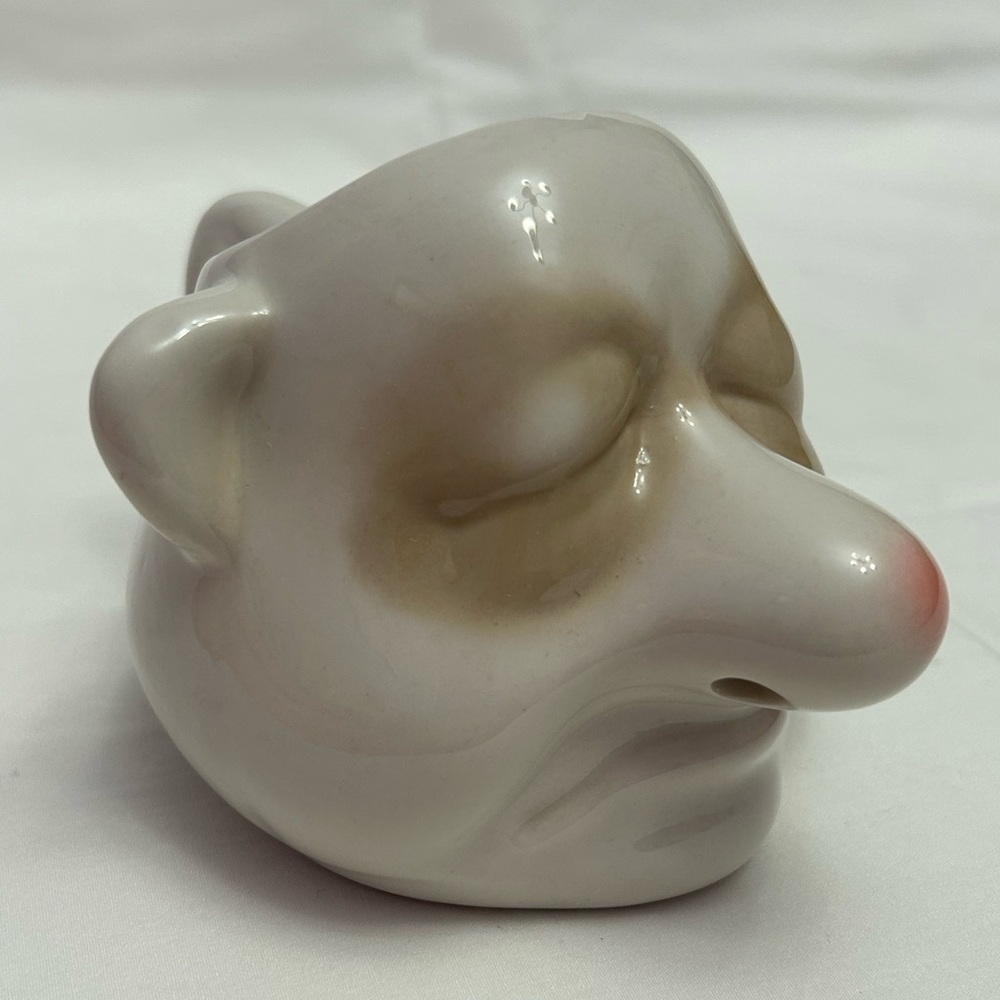 Funny Egg Yolk Separator Man with runny nose. Kitchen Gadget